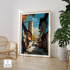 Peja Canvas Print | Balkan City Wall Art showcasing a vibrant street scene in Peja, Kosovo, framed in a modern interior.