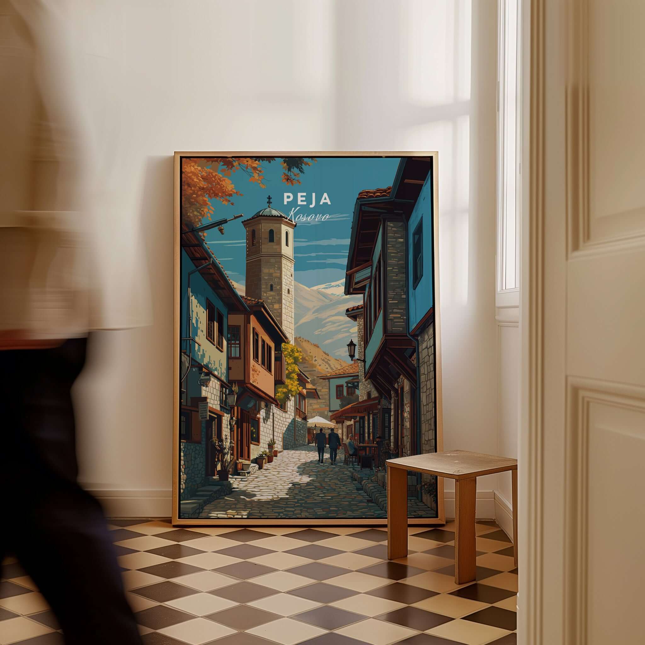 Peja Canvas Print | Balkan City Wall Art featuring a vibrant street scene in a cozy interior setting.