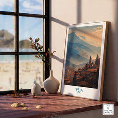 Peja Kosovo Mountain Town Art Print | Rugova Valley Panorama Poster displayed on a windowsill with a view.