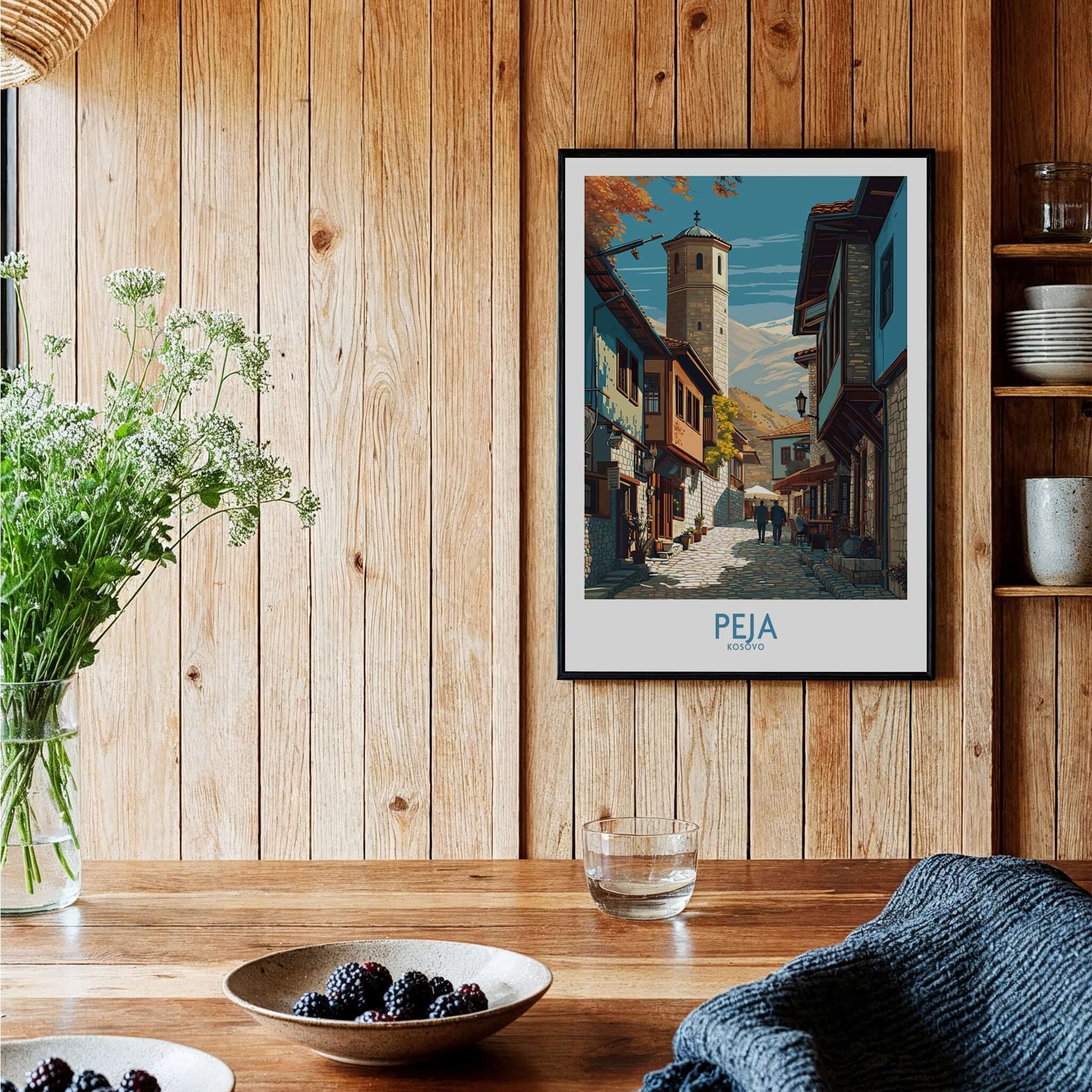 Peja Kosovo Old Town Street Art Print | Historic Tower View Poster displayed in a rustic wooden interior.