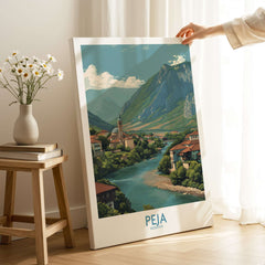 Peja Kosovo River Valley Art Print | Mountain Town Scenery Poster displayed in a cozy living room setting.