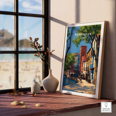 Perpignan Art Print - French Village Poster - Colorful Houses Wall Decor displayed in a sunlit room with a beach view.