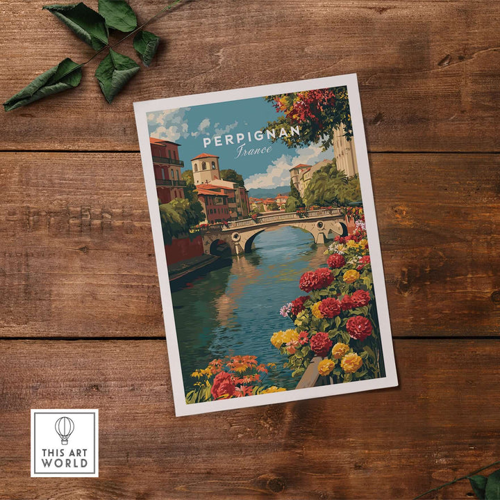 Perpignan cityscape art print featuring River Le Basse and vibrant flowers on a rustic wooden background.