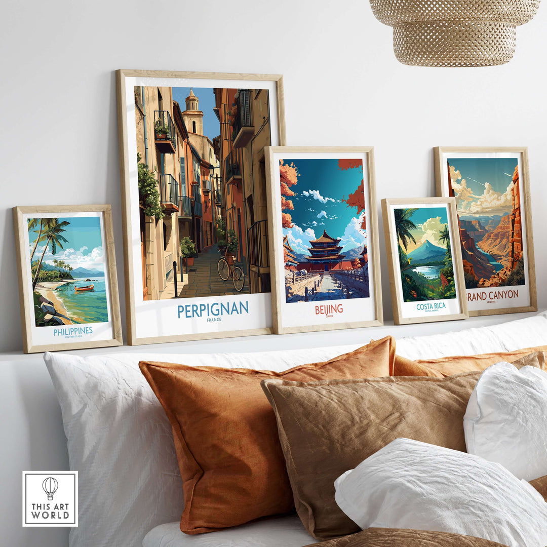Framed travel posters including Perpignan, Beijing, Costa Rica, and Grand Canyon showcased in a stylish living room.