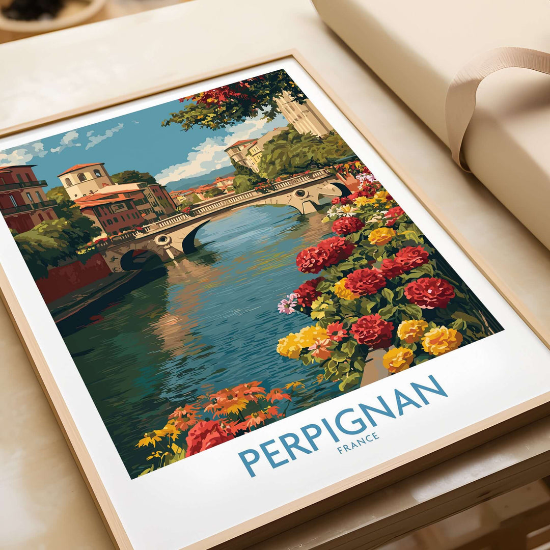 Perpignan River poster featuring a bridge and colorful flowers, showcasing France's picturesque beauty in wall art.