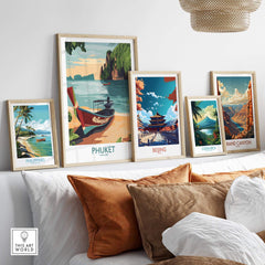 Phuket Thailand Poster displayed among other travel posters in a stylish home decor setting.