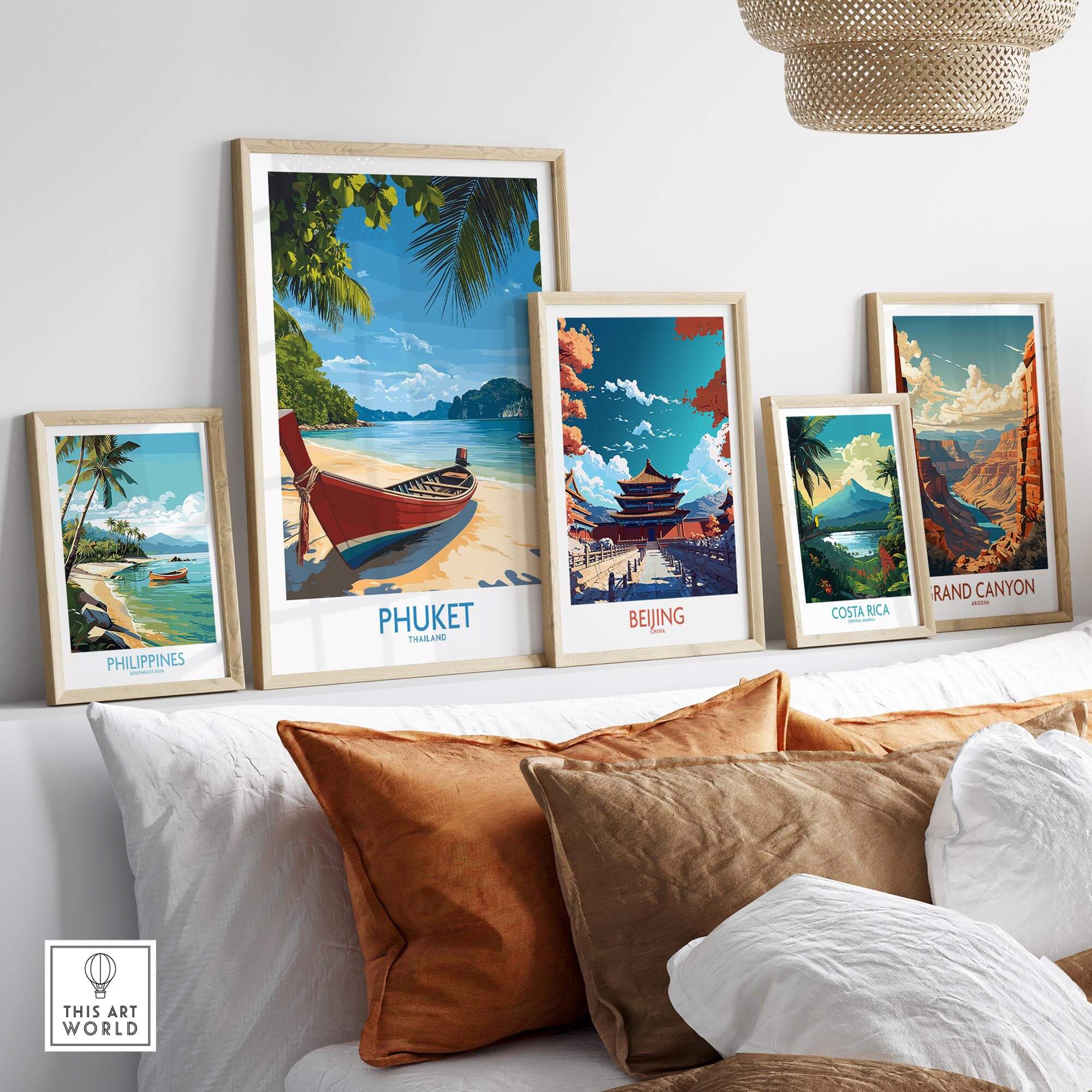 Phuket Travel Poster displayed among other travel posters in a stylish living room setting.