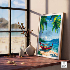 Phuket Wall Art Print showcasing a serene beach and traditional boat in a beautiful frame on a windowsill.