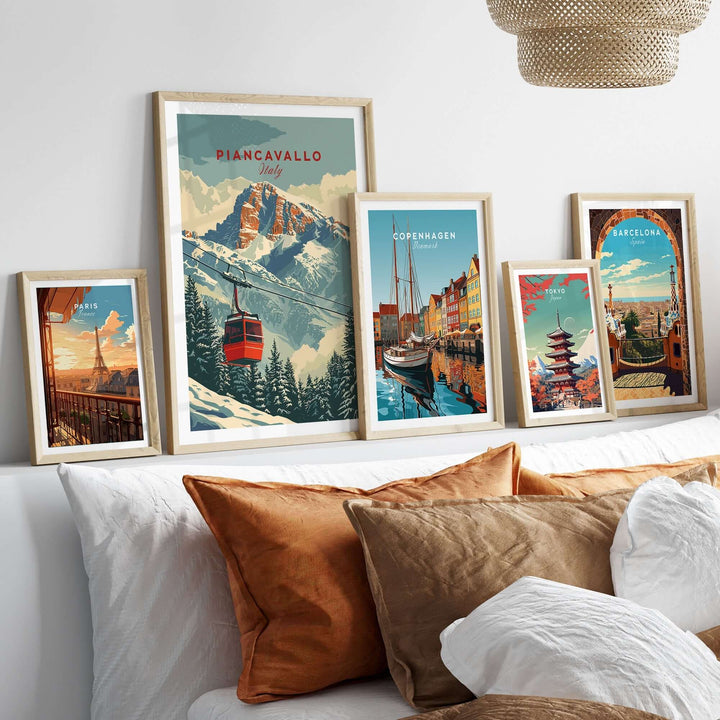 Piancavallo travel poster displayed with other city posters, showcasing ski scenery and vibrant travel art in a cozy living space.