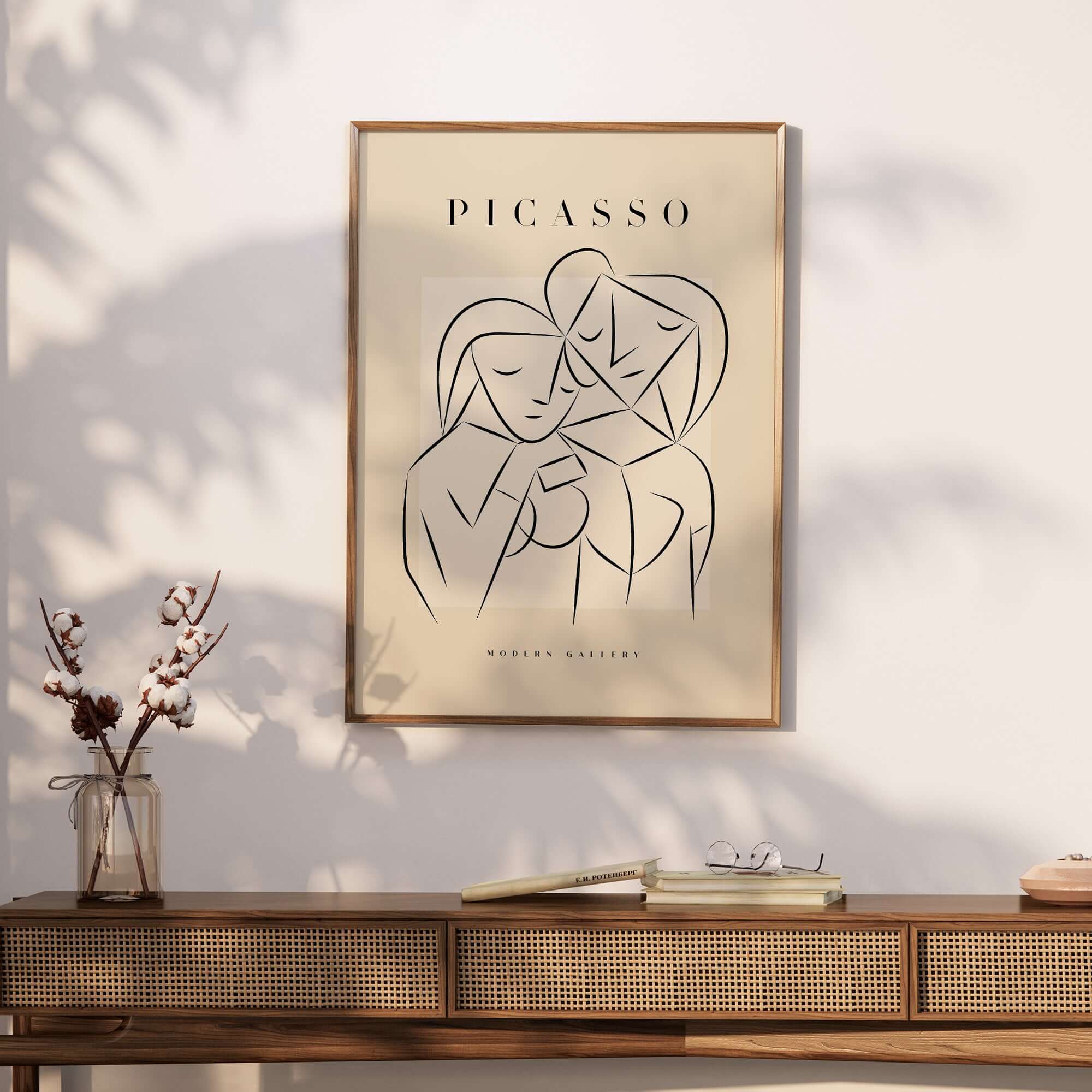 Picasso Abstract Couple Lovers Embrace Line Art Figures Poster Modern Gallery Wall Art displayed on a wall.