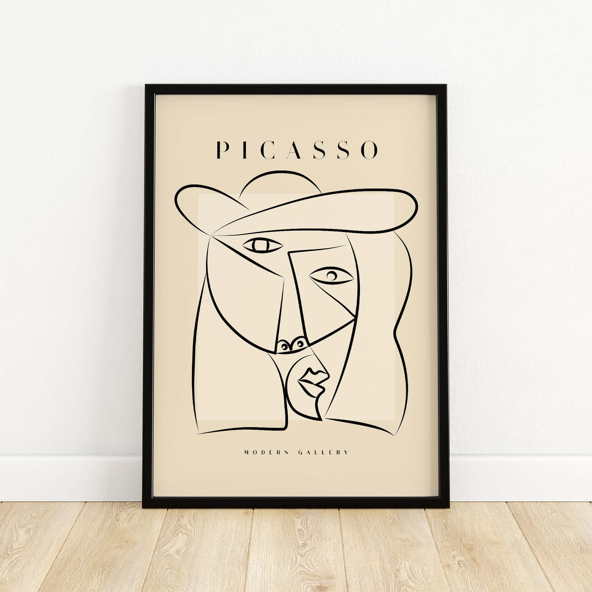 Picasso Abstract Face Hat Line Art Minimalist Portrait Poster Print Modern Gallery on beige wall with black frame.
