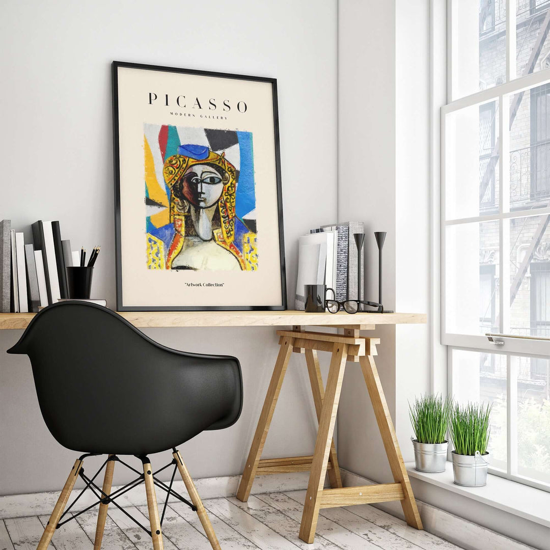 Colorful Picasso abstract face portrait poster on a modern desk in a stylish interior with natural light.
