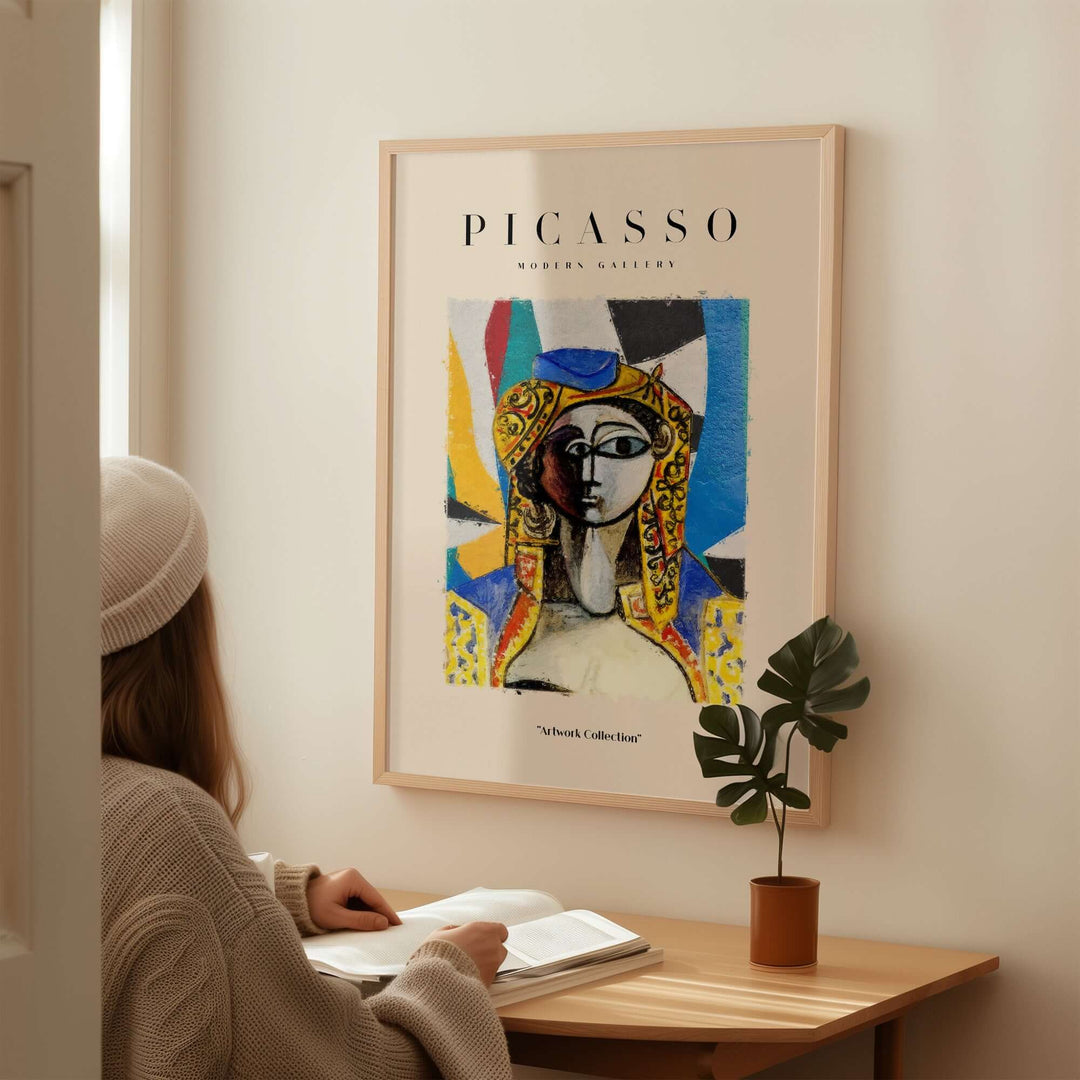 Colorful Picasso-inspired abstract face portrait poster in modern decor setting.