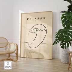 Picasso Abstract Owl Line Art Minimalist Bird Poster Modern Gallery Wall Art displayed in a stylish room with plants.