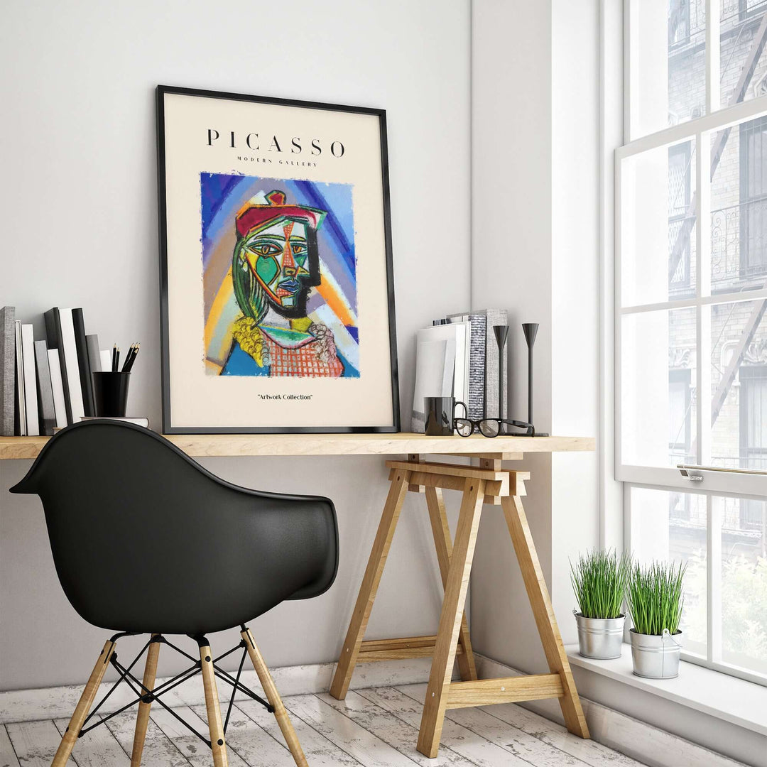 Colorful Picasso-inspired cubist abstract art print in modern workspace decor.