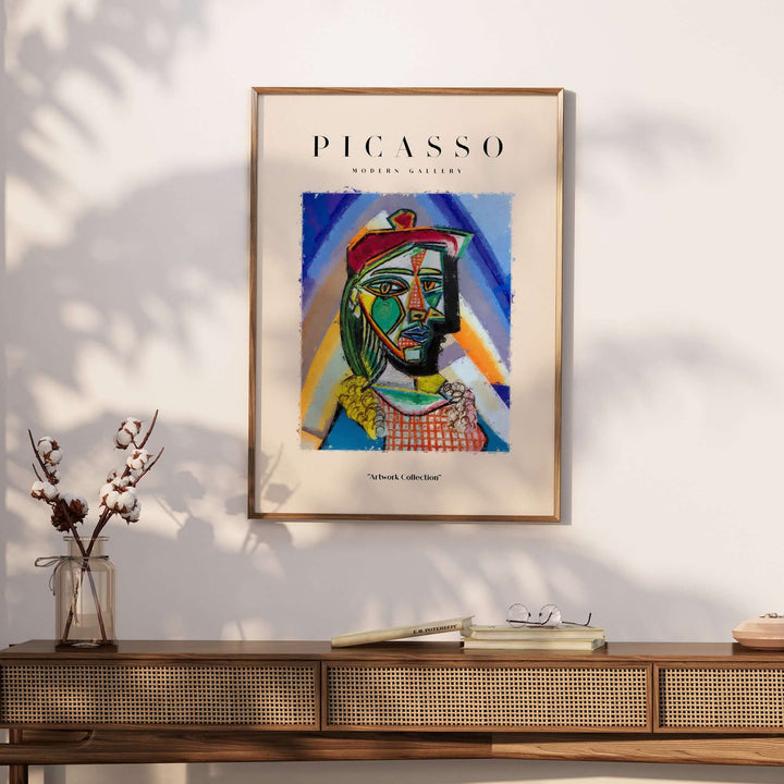 Colorful Cubist portrait of a figure by Picasso, featuring bold outlines and vibrant colors, perfect for modern wall art.