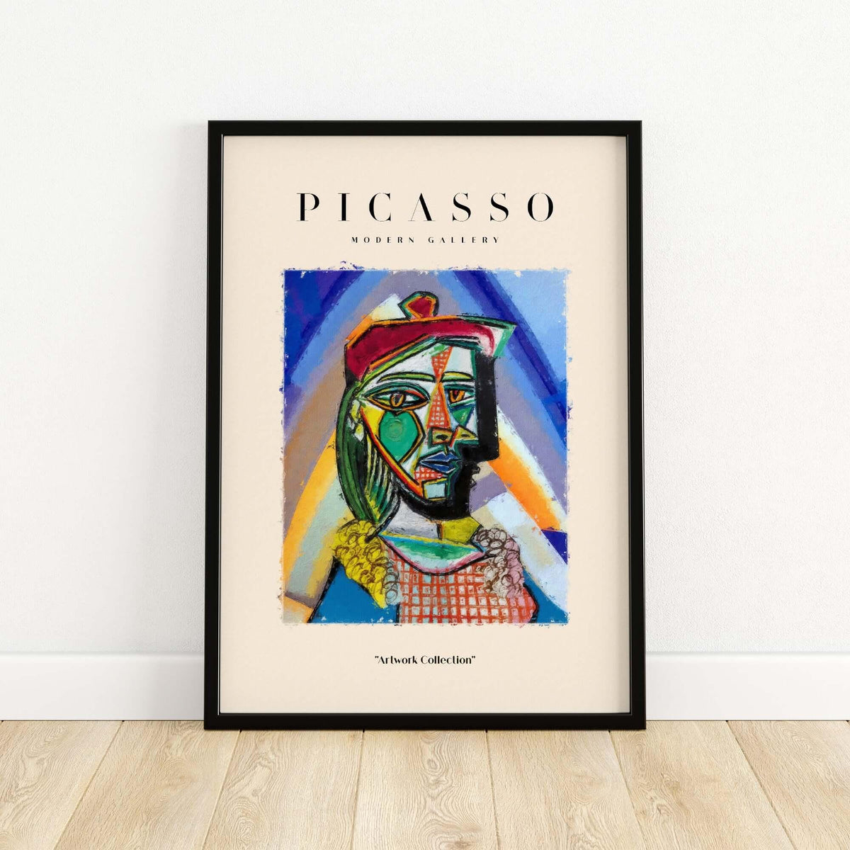 Picasso Bust Portrait Abstract Art Print Colorful Cubist Poster Artwork Collection in a modern frame on a wooden floor.