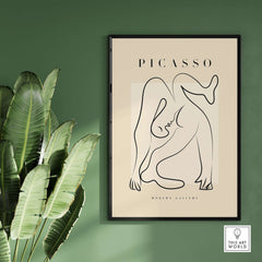 Picasso Contorted Figure Abstract Pose Line Art Modern Gallery Poster Wall Art framed with green leaves backdrop.