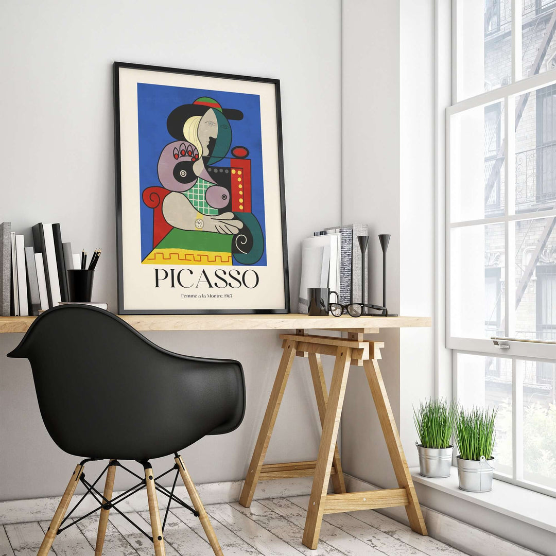 Colorful Picasso art print 'Femme à la Montre' displayed on a stylish desk with modern decor.