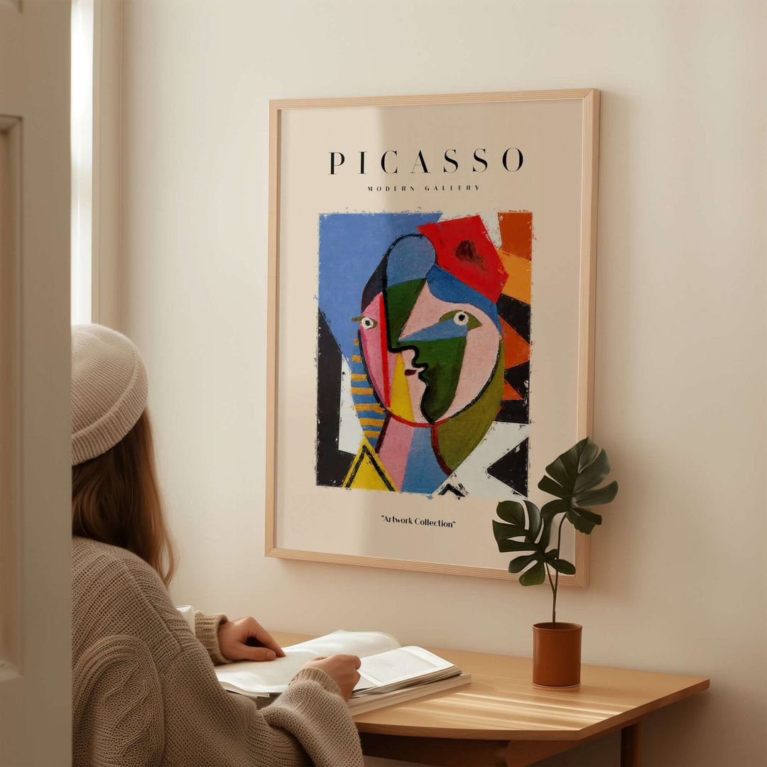 Colorful Picasso-inspired geometric face abstract art print poster in modern interior setting.