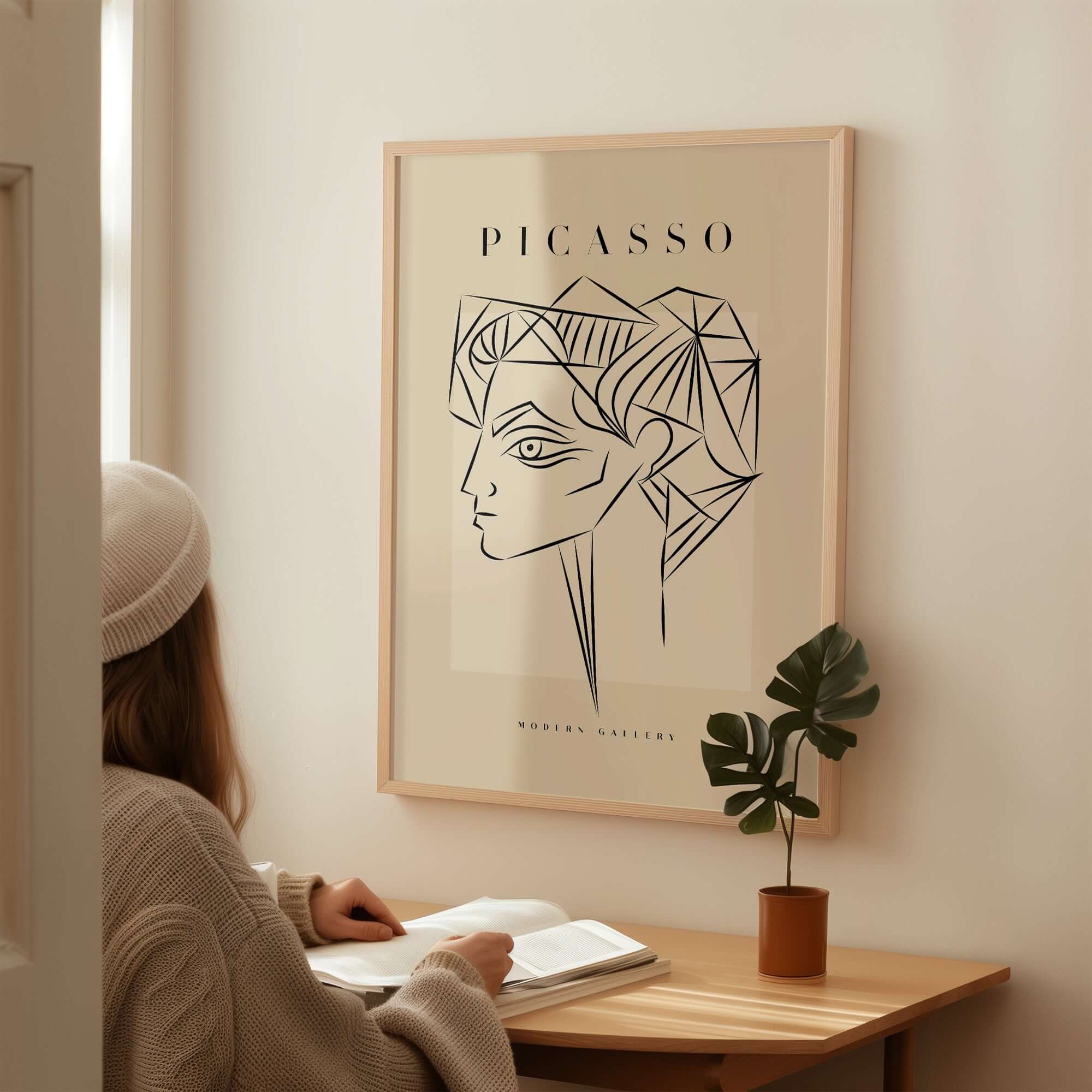 Picasso Geometric Profile Head Line Art Angular Abstract Poster Modern Gallery Print hanging on wall with person studying.