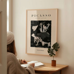 Picasso Guernica Inspired Falling Figures Art Print Abstract Black White Poster Collection displayed in a modern home setting.