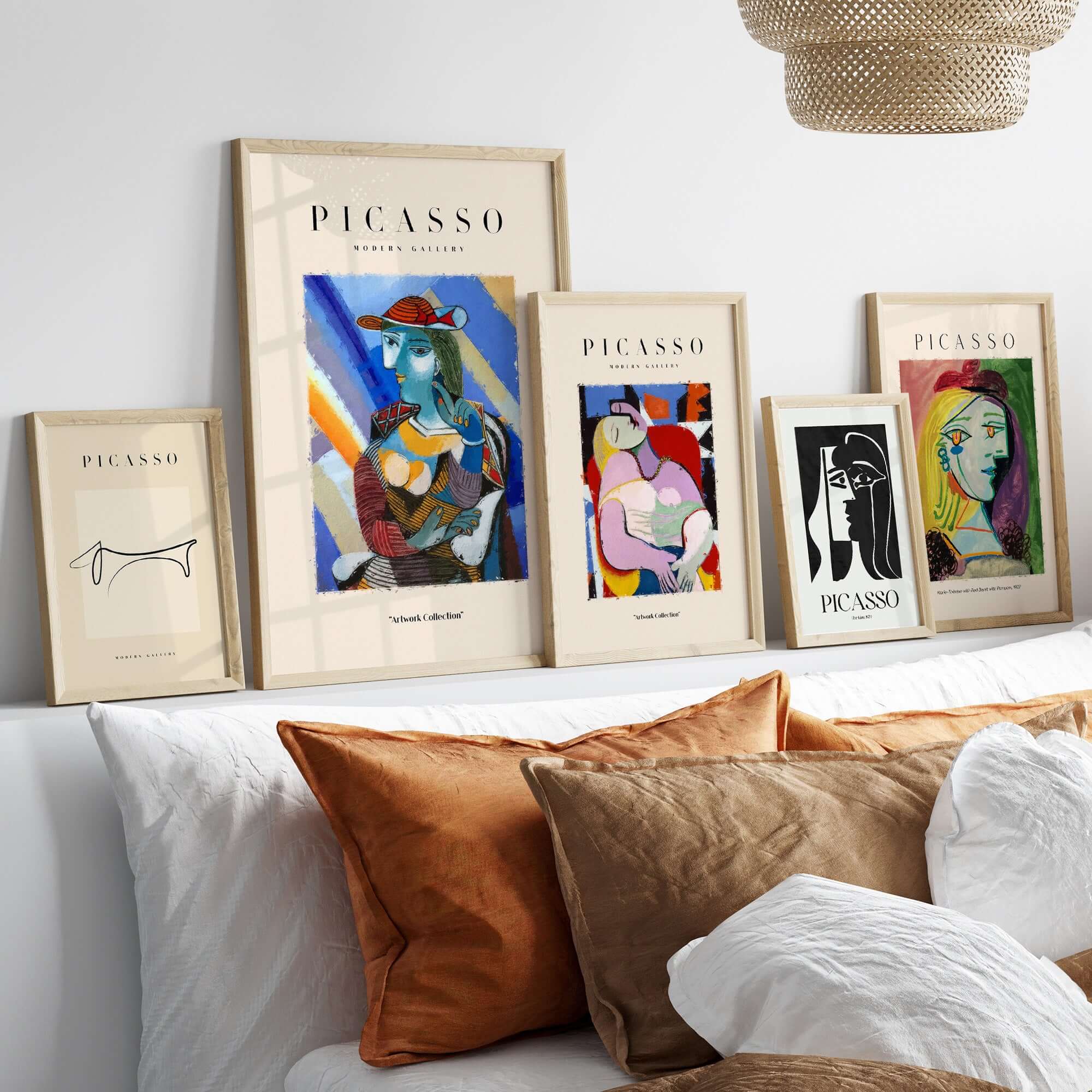 Gallery display of Picasso Woman Red Hat Blue Face Portrait Print Colorful Cubist Poster Artwork Collection framed artworks.