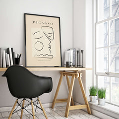Picasso Line Art Abstract Profile Geometric Modern Gallery Wall Art Print displayed in a stylish workspace setting.