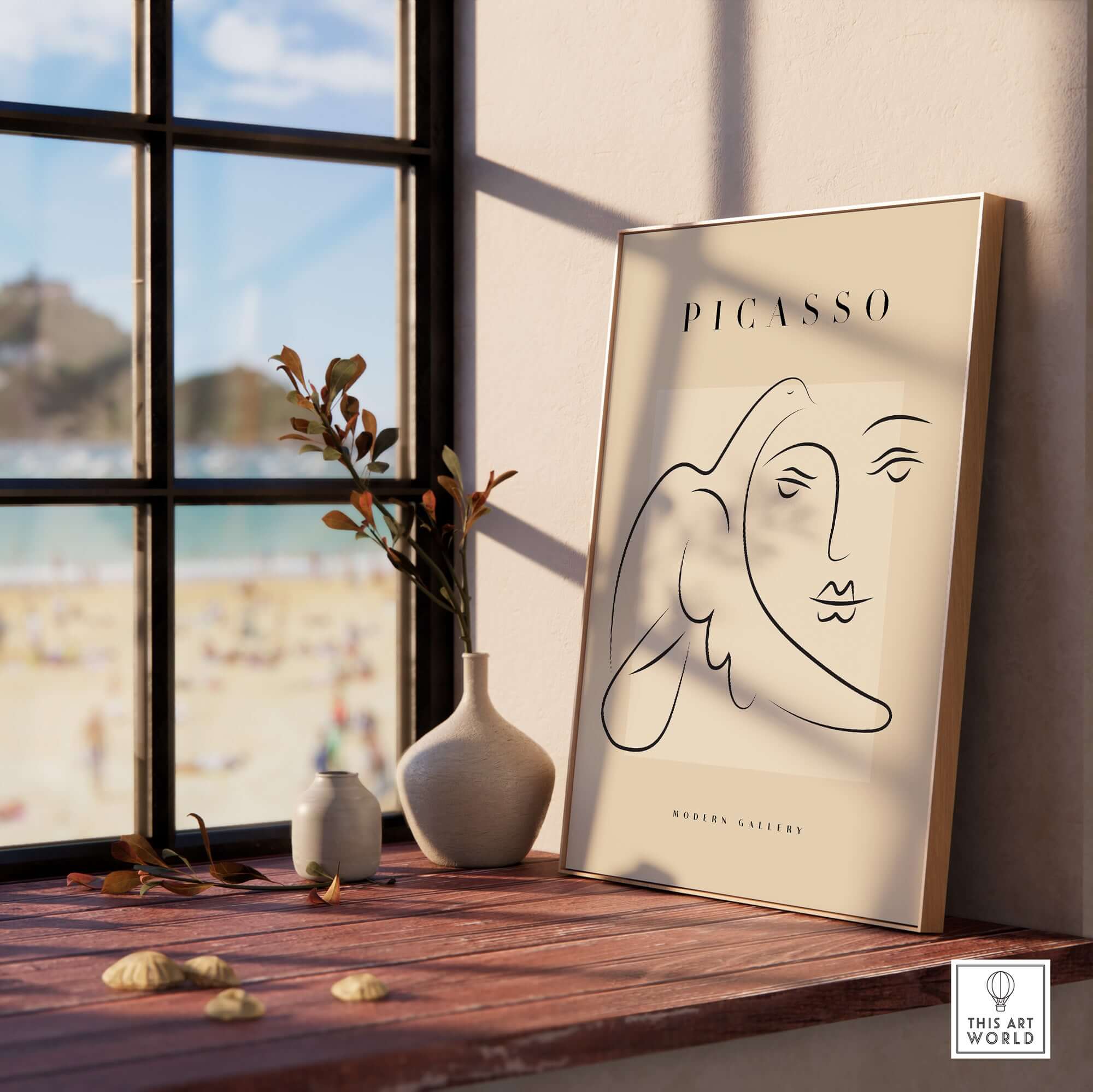 Picasso Line Art Face Dove Minimalist Modern Gallery Poster Print displayed on a wooden table by a window with beach view.