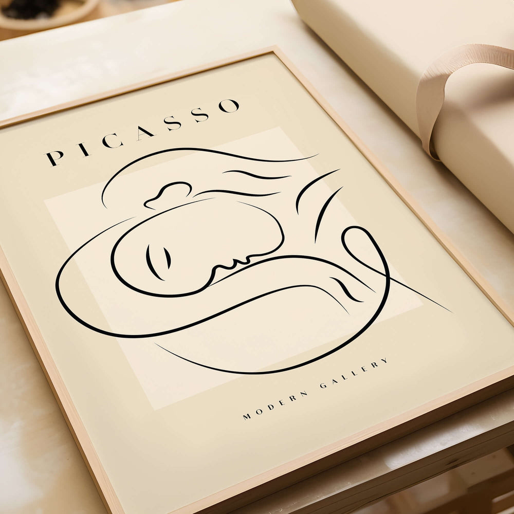 Picasso Line Art Reclining Sleeping Face Modern Gallery Poster Wall Art showcased in minimalist frame on beige background.