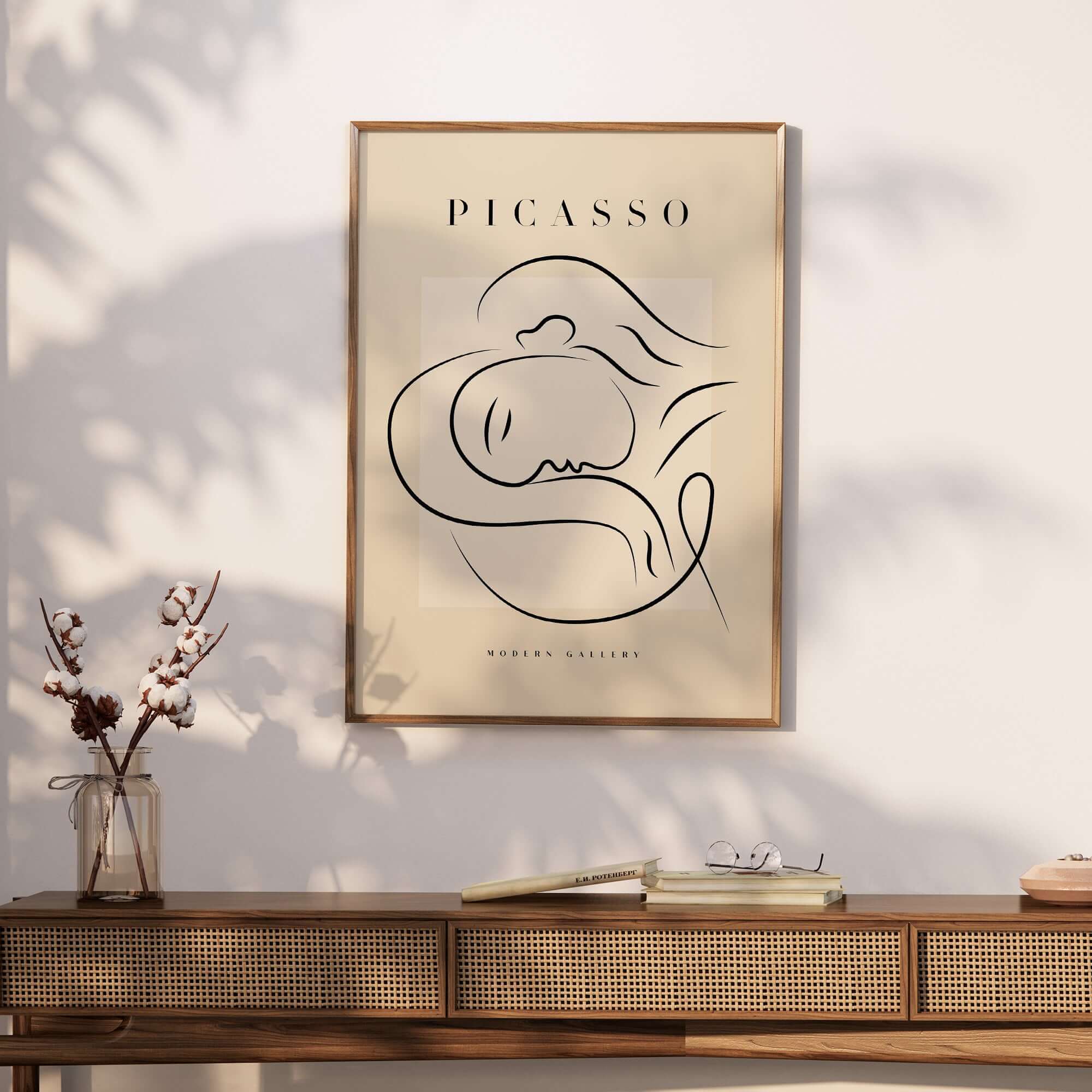 Picasso Line Art Reclining Sleeping Face Modern Gallery Poster Wall Art displayed on a wooden console table.