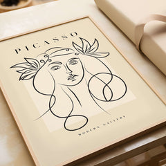 Picasso Line Art Woman Leaf Crown Modern Gallery Wall Art Poster showcasing an elegant female face with leaf crown design