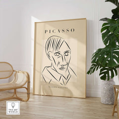 Picasso Man Portrait Sharp Lines Abstract Face Poster Modern Gallery Print Wall Art displayed in a stylish interior.
