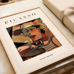 Picasso Man Straw Hat Abstract Portrait Art Print Cubist Poster Artwork Collection framed wall art in modern gallery setting.