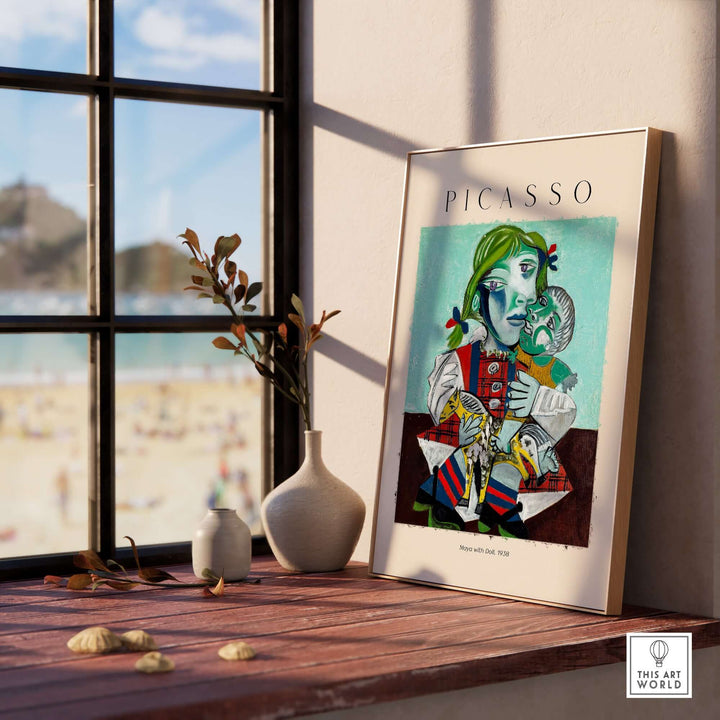 Picasso Maya with Doll 1938 colorful cubist portrait print displayed in a modern room by a window.