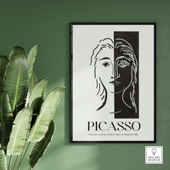 Picasso Portrait Deux Parties Black White Split Face Art Print Poster displayed on wall with green background