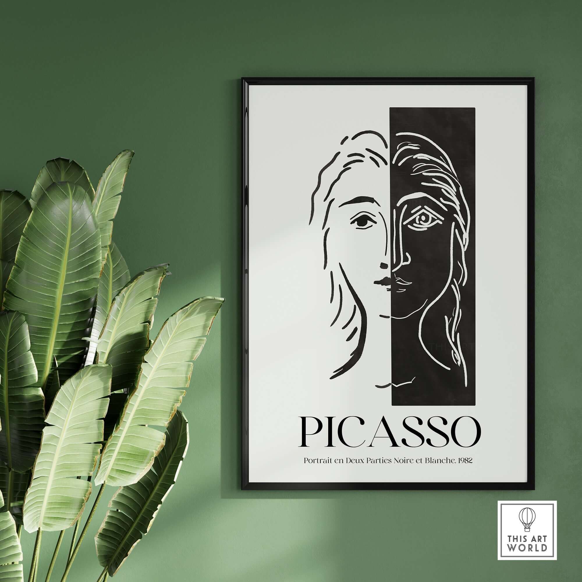 Picasso Portrait Deux Parties Black White Split Face Art Print Poster displayed on wall with green background