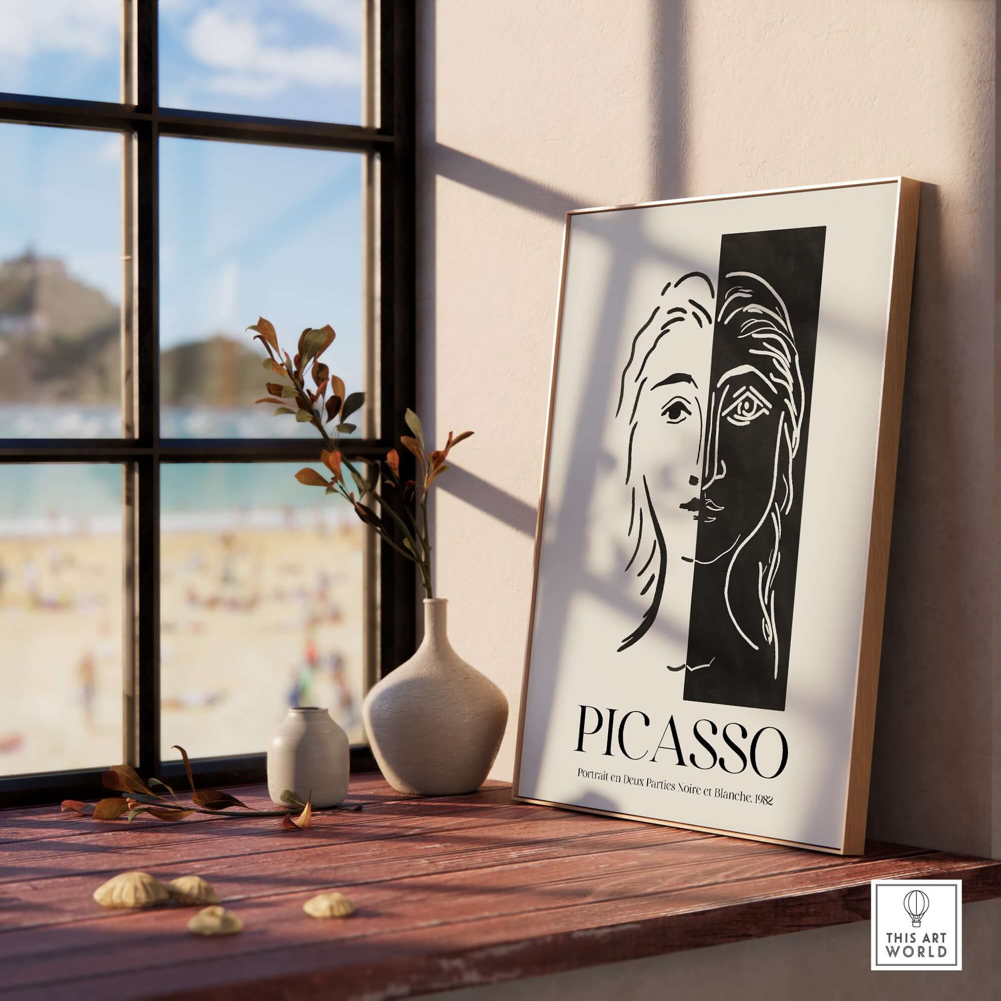 Picasso Portrait Deux Parties Black White Split Face Art Print Poster displayed on a windowsill with beach view.