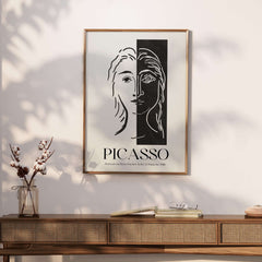 Picasso Portrait Deux Parties Black White Split Face Art Print Poster displayed on wall above a wooden console.