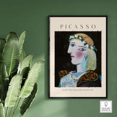 Picasso Portrait Marie Thérèse Walter Garland 1937 Art Print Cubist Woman Poster displayed on green wall with plants.