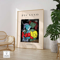 Picasso Reading Couple Abstract Figures Art Print Cubist Poster Artwork Collection displayed in modern interior with plant.