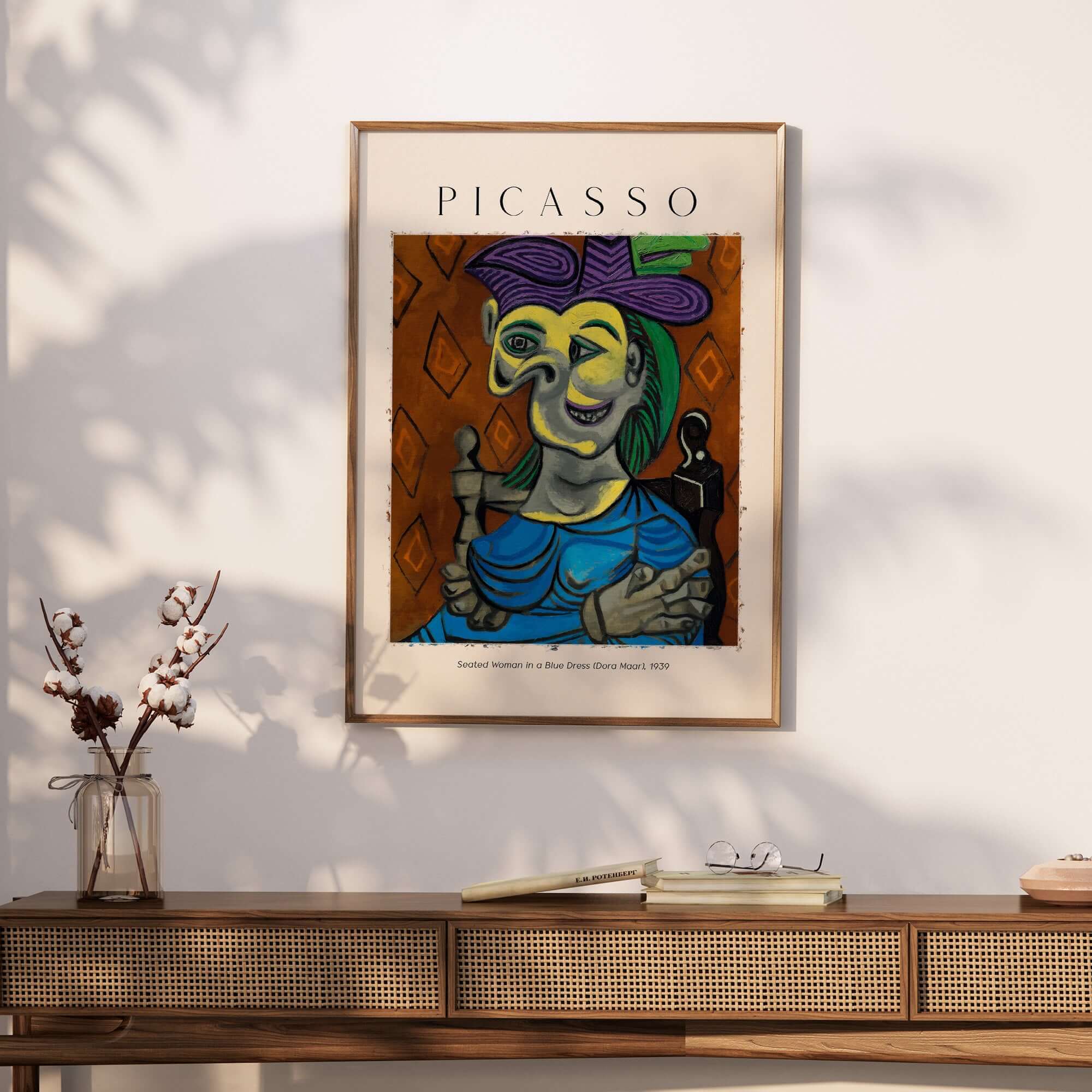 Picasso Seated Woman Blue Dress Dora Maar 1939 Art Print Cubist Portrait Poster displayed on a wooden table.