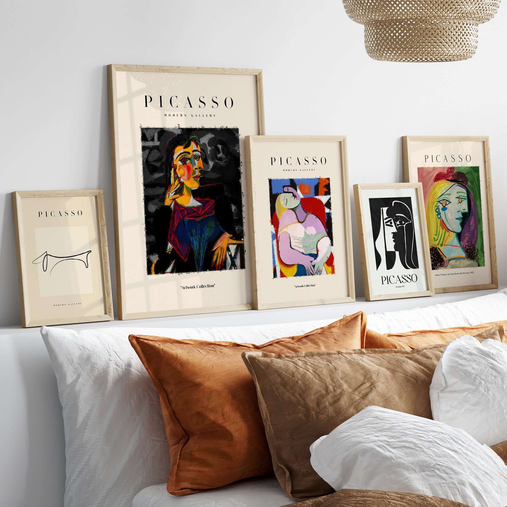 Picasso Seated Woman Cubist Portrait Art Print Modern Gallery Artwork Poster displayed with other Picasso art prints in a modern setting.