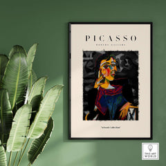 Picasso Seated Woman Cubist Portrait Art Print Modern Gallery Artwork Poster displayed in a modern room with plants.