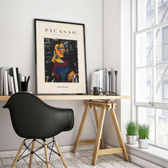 Picasso Seated Woman Cubist Portrait Art Print Modern Gallery Artwork Poster displayed in a stylish workspace.