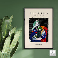 Picasso Seated Woman Reading Abstract Figure Art Print Modern Gallery Artwork Poster displayed on green wall.