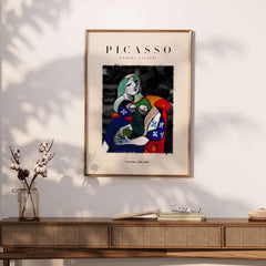 Picasso Seated Woman Reading Abstract Figure Art Print Modern Gallery Artwork Poster displayed on a wall.