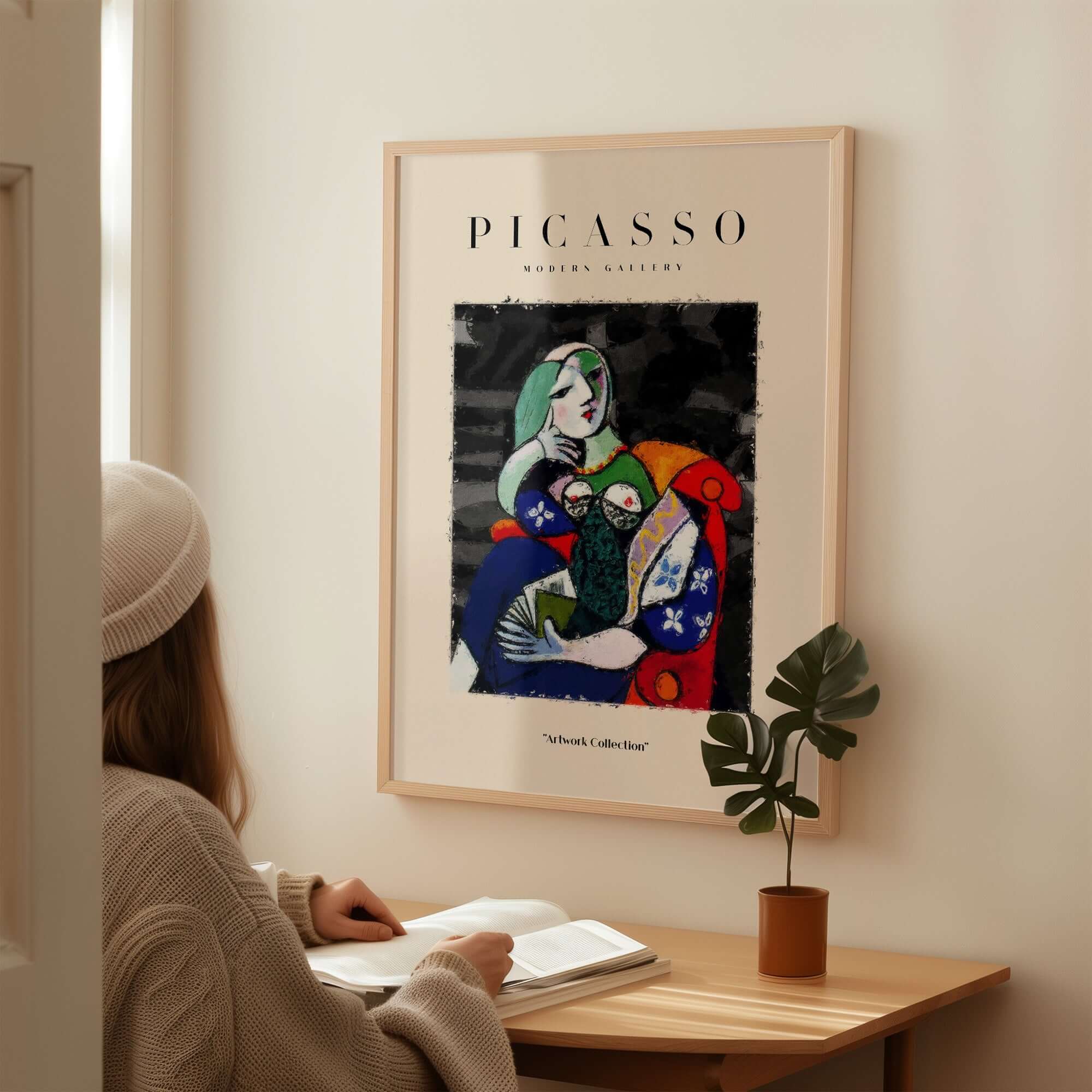 Picasso Seated Woman Reading Abstract Figure Art Print Modern Gallery Artwork Poster displayed in a stylish interior setting.