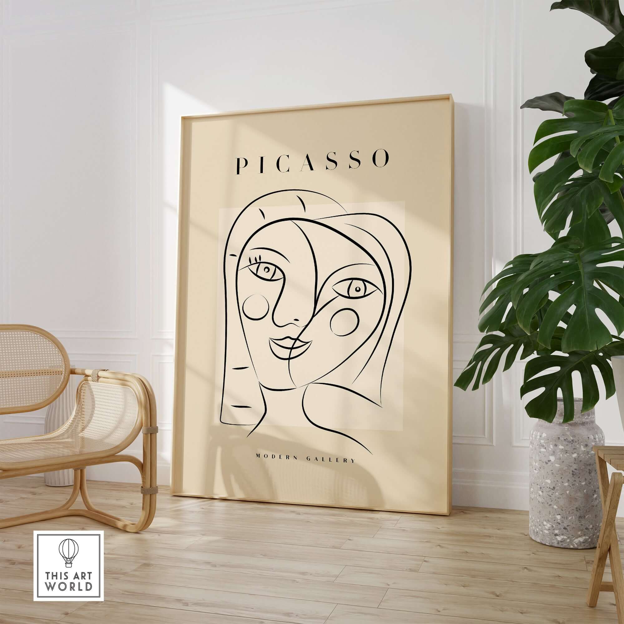 Picasso Smiling Double Face Abstract Portrait Line Art Modern Gallery Poster Print displayed in a chic interior with plants.