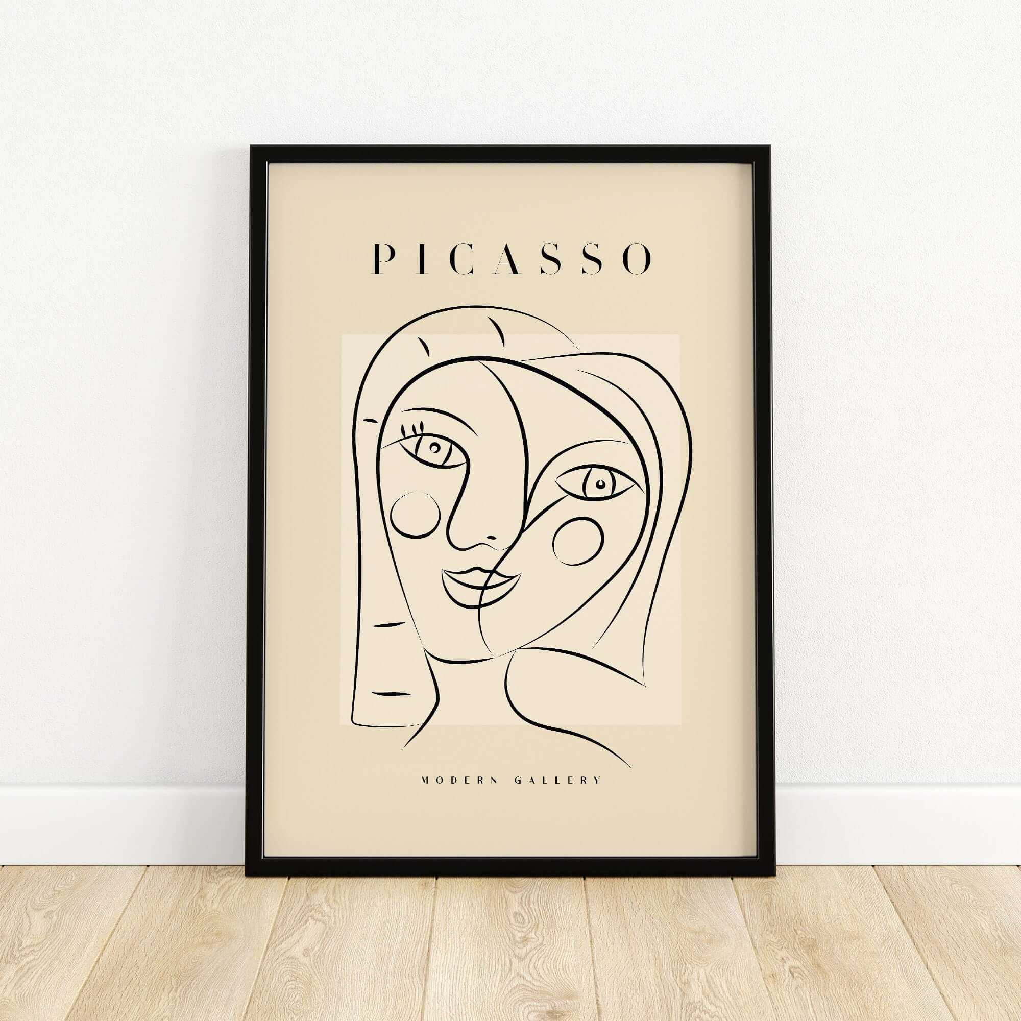 Picasso Smiling Double Face Abstract Portrait Line Art Modern Gallery Poster Print in a black frame on a beige background.